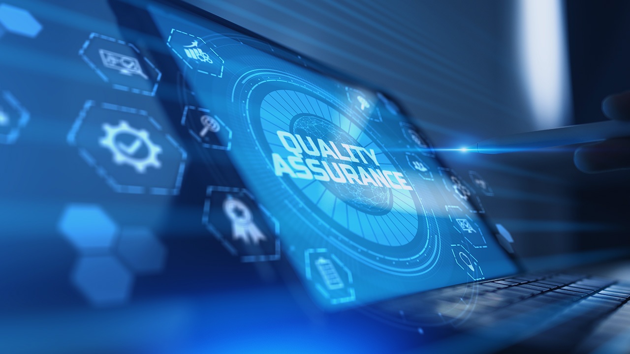 Computer screen displays the words Quality Assurance